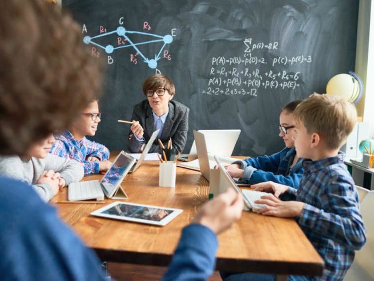 Students collaborating together in a math class