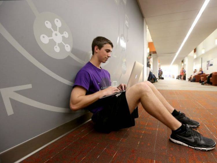 A GCU student working online