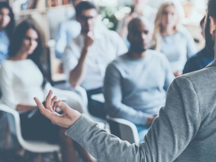 Businessman addressing an audience of investors