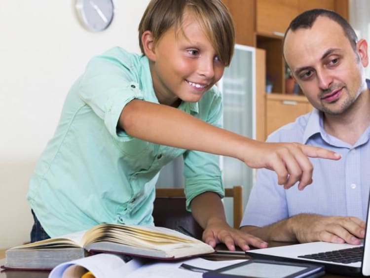 teacher helping gifted student