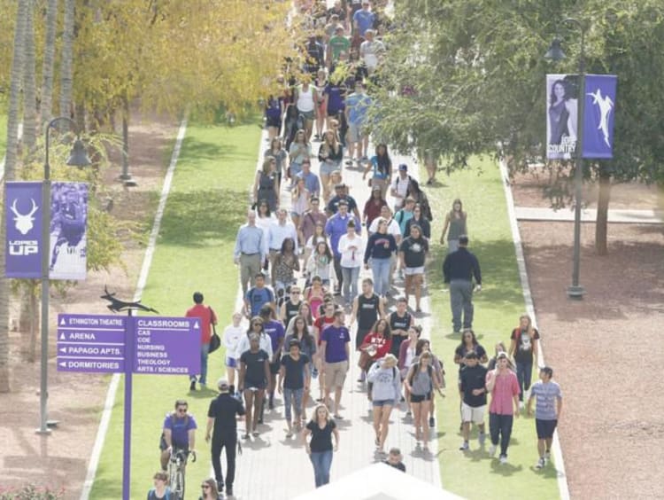 students walking on campus