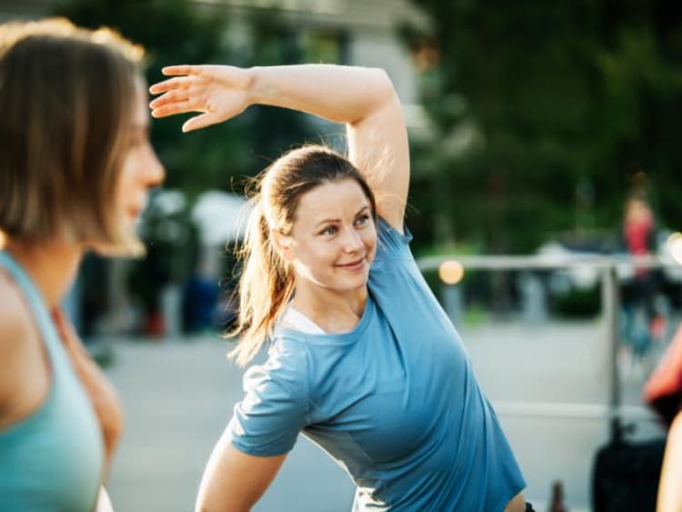 Women exercising in college