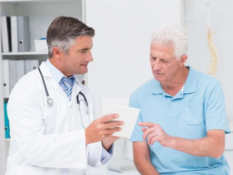 doctor talking to patient