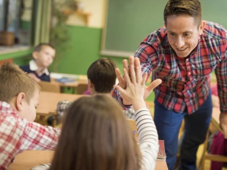 Teacher engaging with students