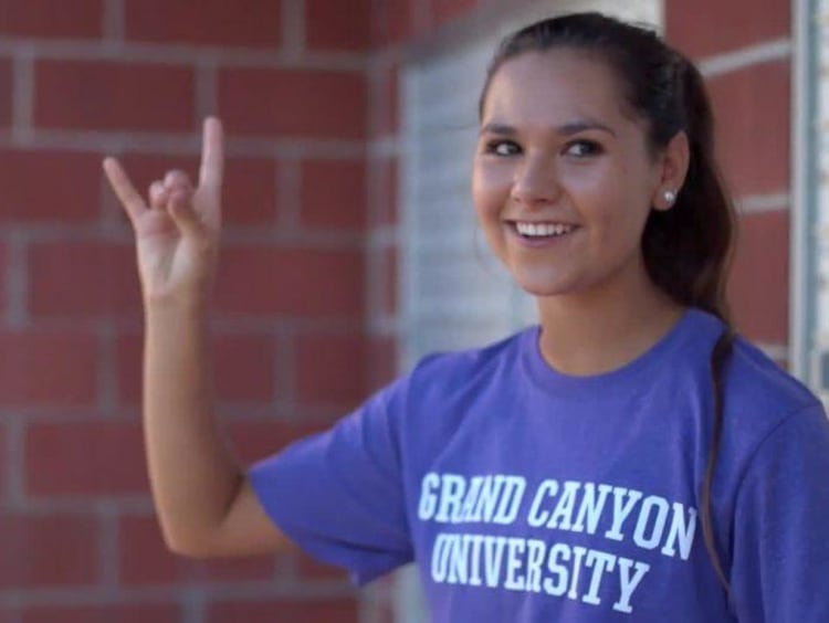 Tatum with a Lopes Up sign