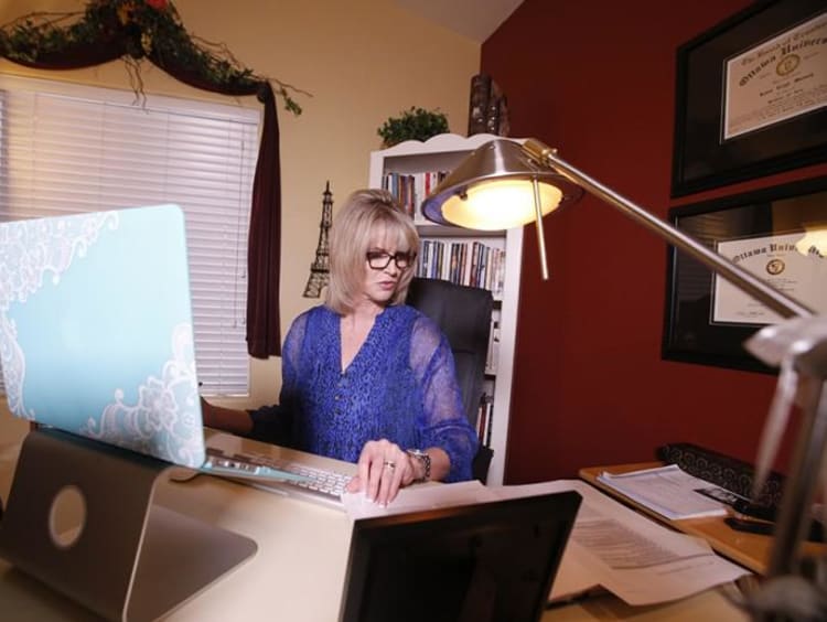 Doctoral Learning working at a desktop computer