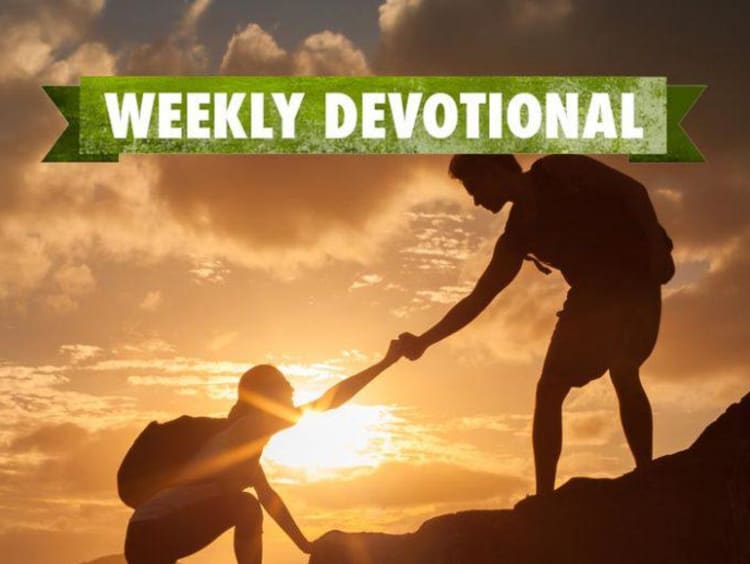 Weekly Devotional: One person helping another up a mountain