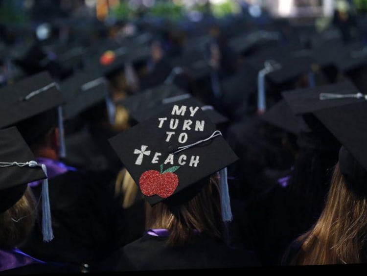 My turn to teach written on graduation cap with a glittery red apple below text