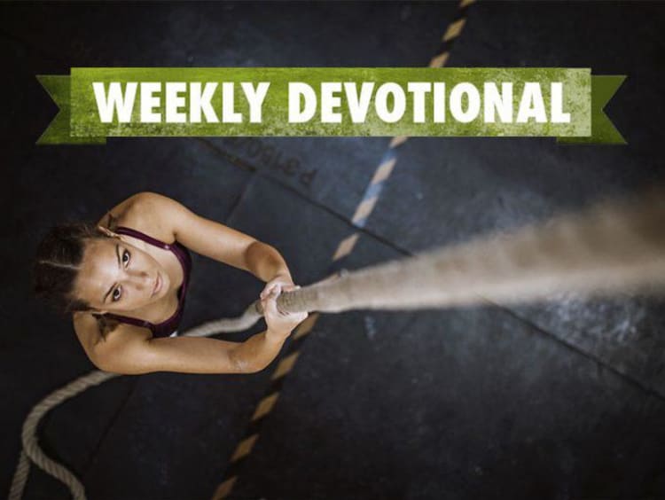 Weekly Devotional: Woman climbing up a rope