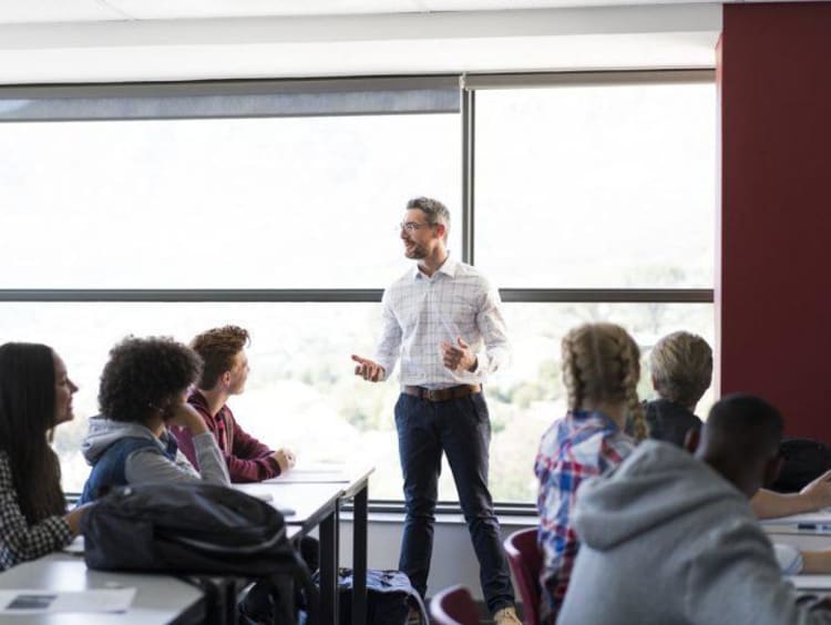 Adult Male Instructor teaches young adults