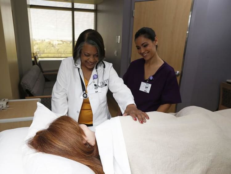 a health care provider taking care of a patient