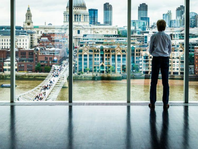 Guy looking out a window