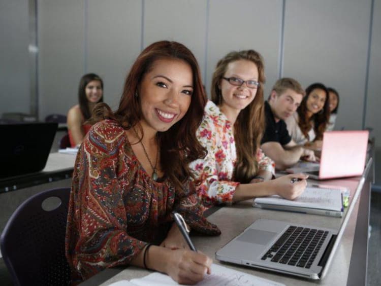 women on the computer in class