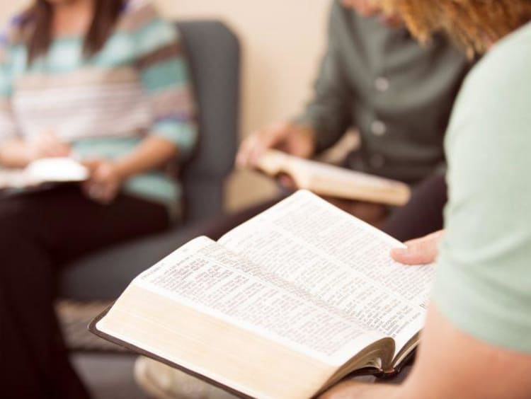 group reading the Bible