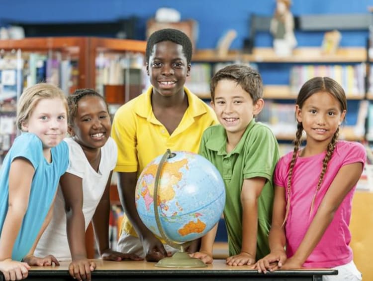 Children sharing in classroom setting