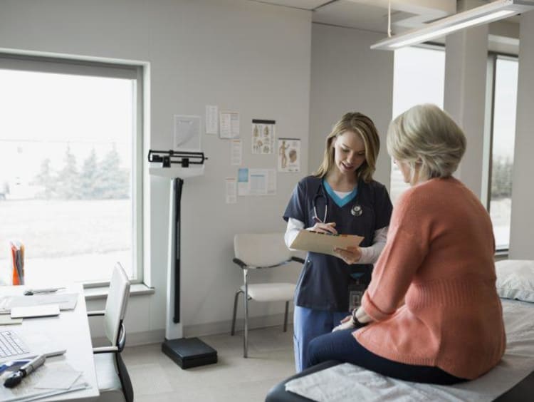 Nurse interacting with a patient