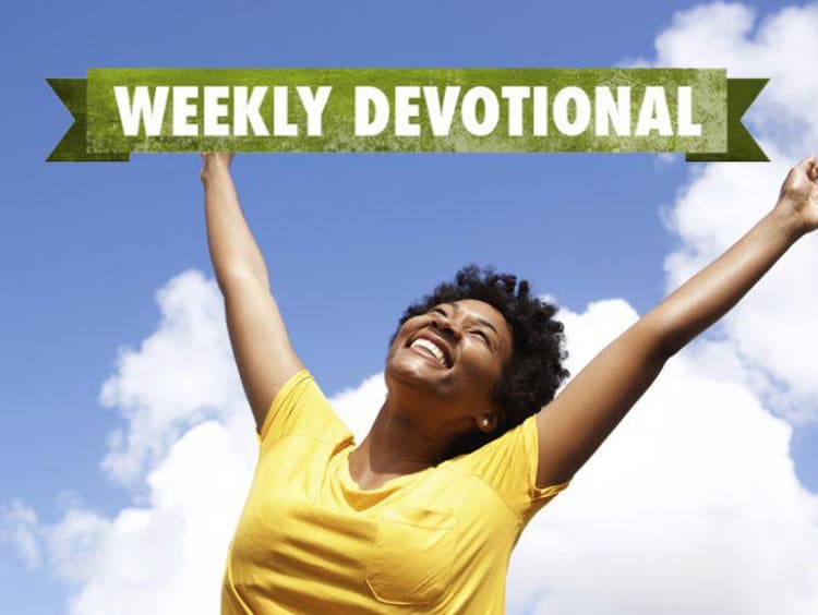 Weekly Devotional: Woman smiling with her arms up