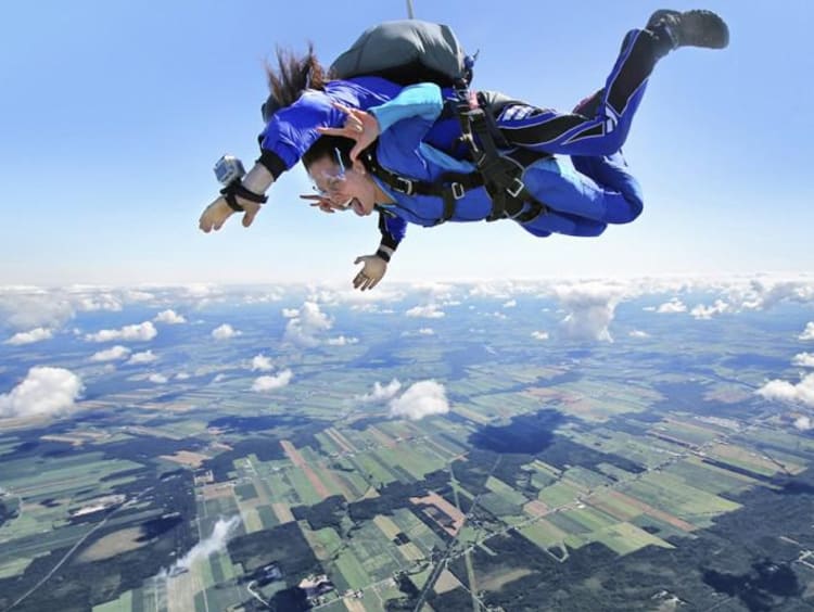 two people sky diving