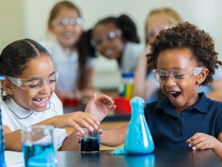 Little girls with a science experiment