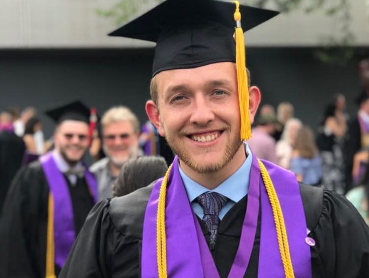 GCU student in a cap and gown 