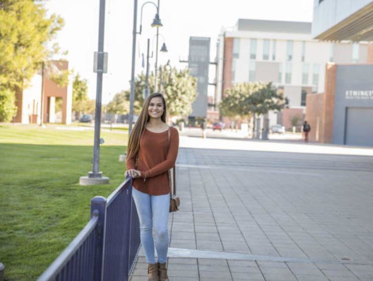 Tatum standing in front of the Arena