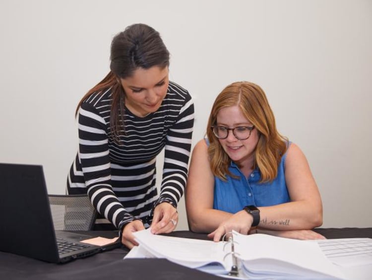 Political campaign workers collaborating on a project