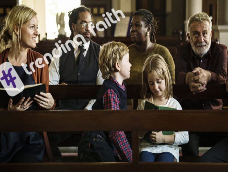 Family sits in church before service starts