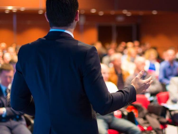 A seminary professor presenting at a convention