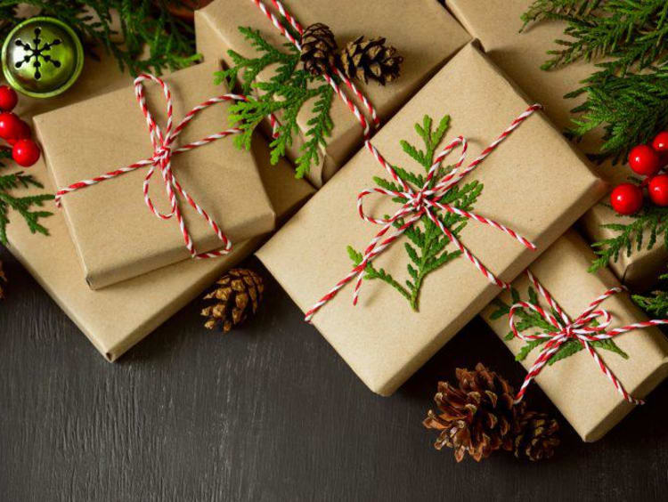 A group of wrapped presents under the tree