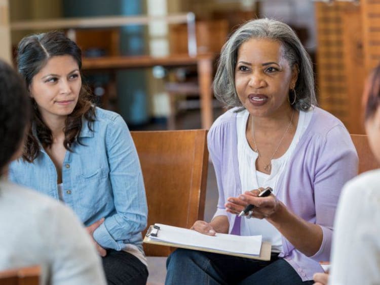 three women talking