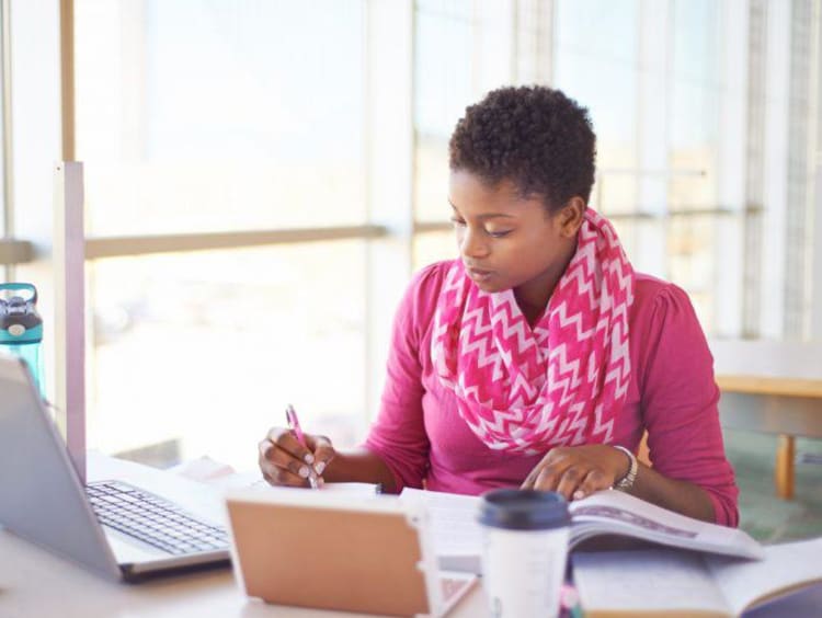 woman working on homework