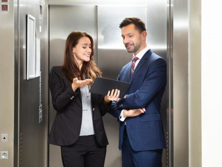 Woman giving an elevator speech