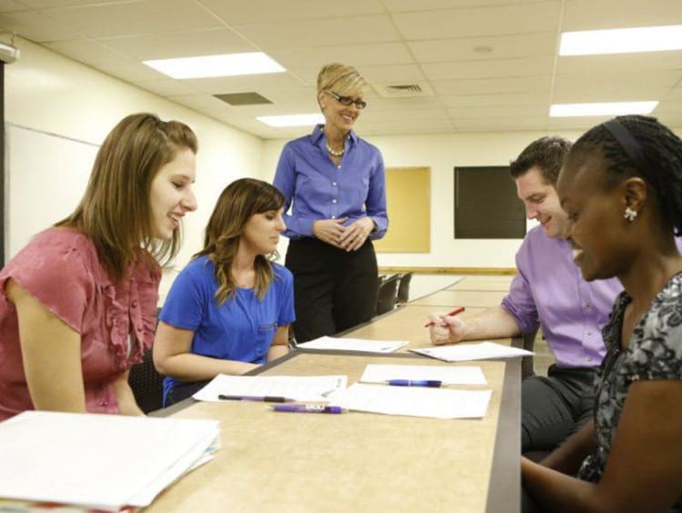 Cohort group of doctoral students meet in a group