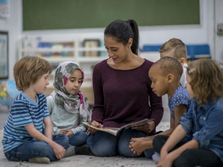 Reading circle time with teacher