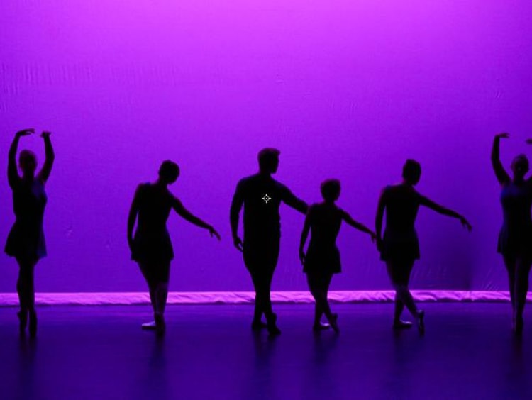 people dancing on a stage