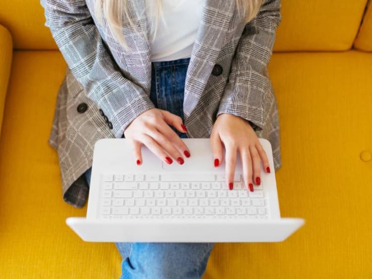 Student working on a laptop from home