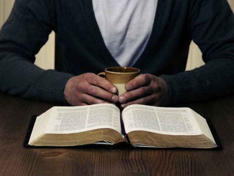 A student reading the Bible