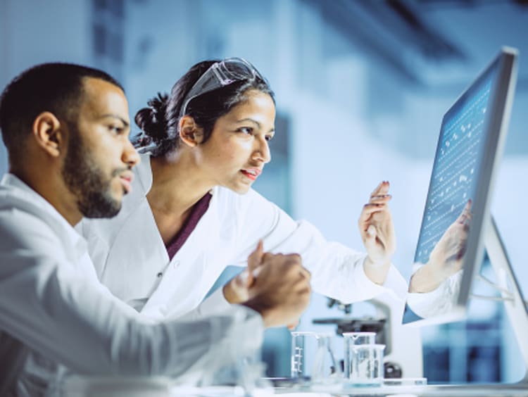 Chemists analyzing samples in a laboratory