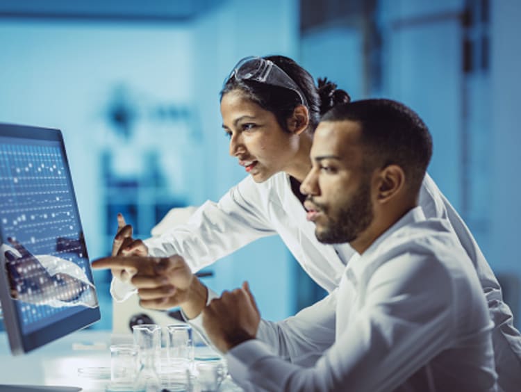 laboratory geneticists analyzing genetics