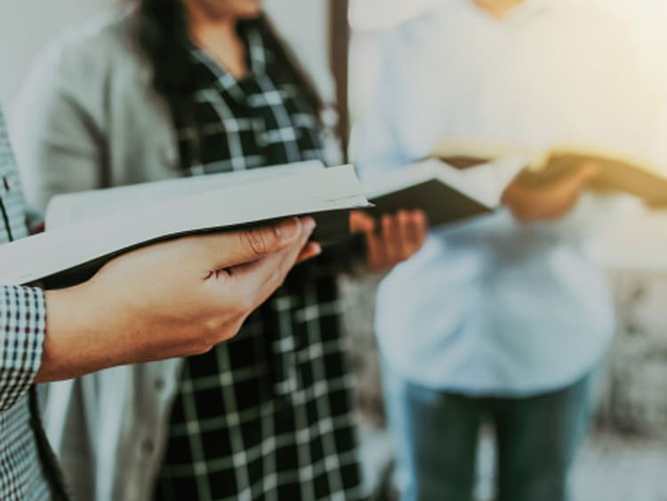 Christian group reading the Bible to learn Christian culture