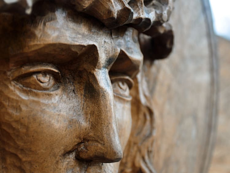 Closeup of a wooden Grecian or Roman statue