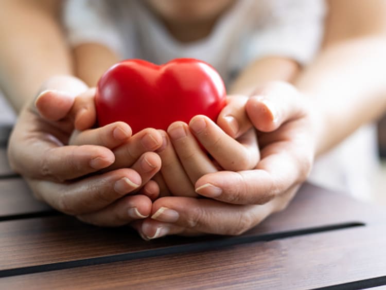 parent and child holding heart for soul care