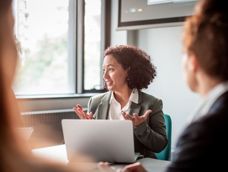 presenter explaining thought leadership to coworkers