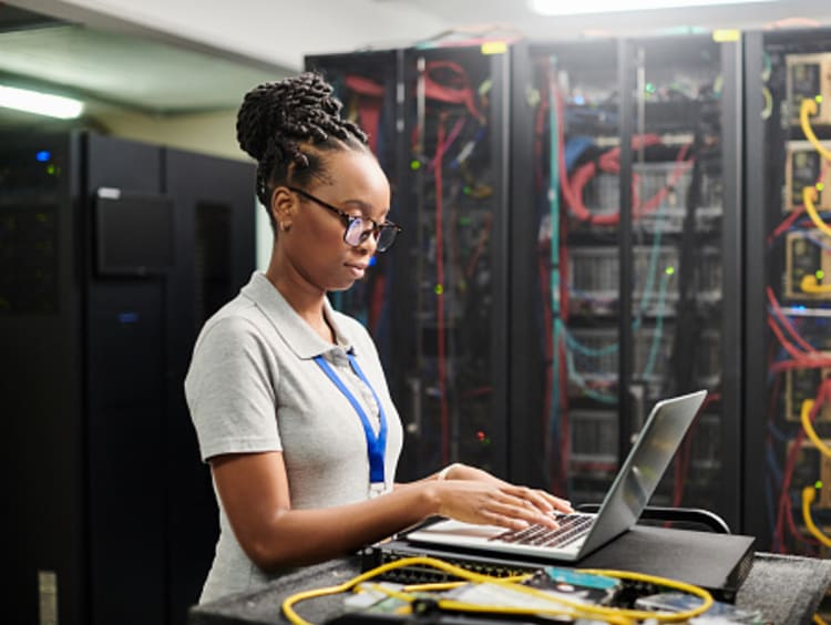 cybersecurity analyst checking equipment for security breaches
