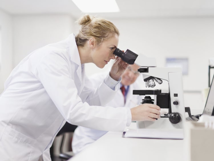 Female pathologist researches the causes of illnesses