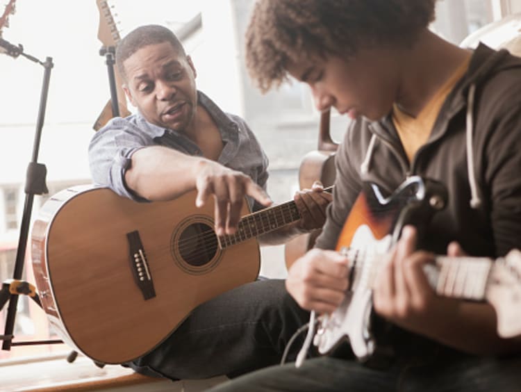 music teacher proud of his work with students