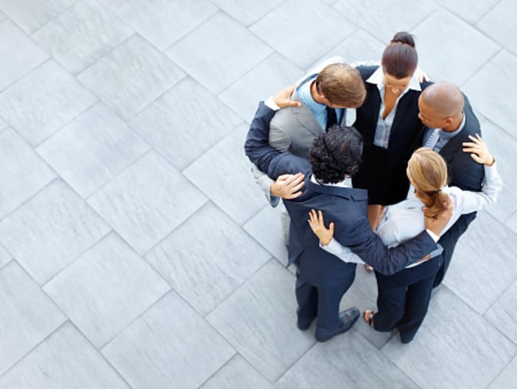 business people praying from God's perspective