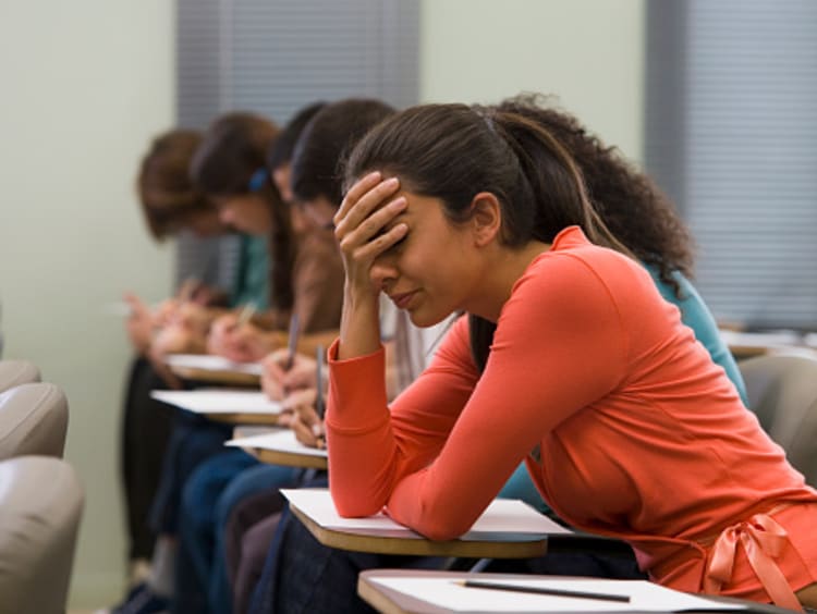 student angry at God while taking test