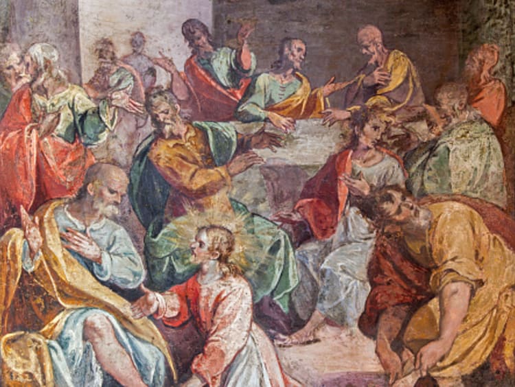 Italian art of Jesus demonstrating to honor one another by washing feet with disciples in background