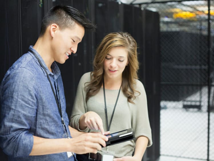 Cybersecurity professionals running tests on equipment